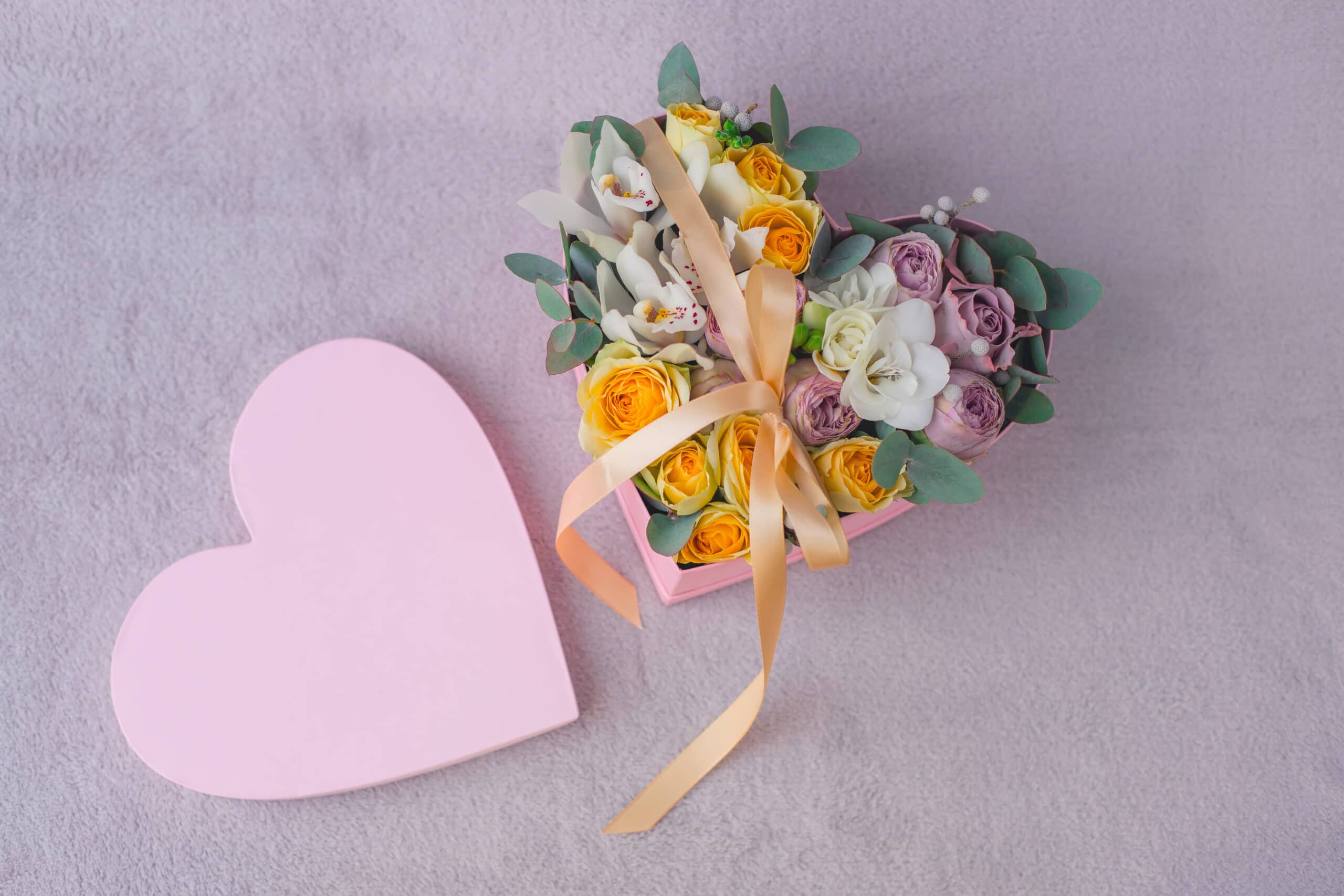 Flowers in a love heart hat box